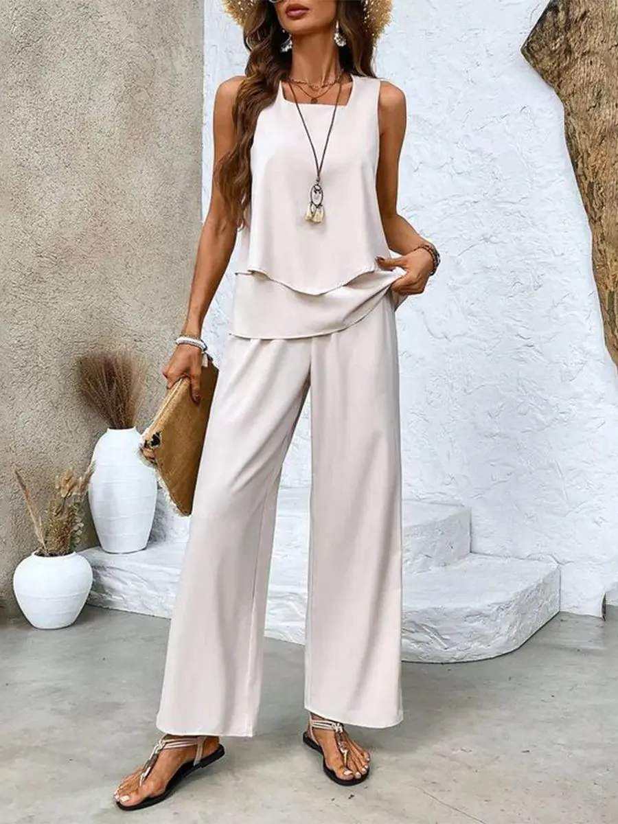 Women's white layered top and wide-leg trousers plus-size set with flowy breathable fabric
