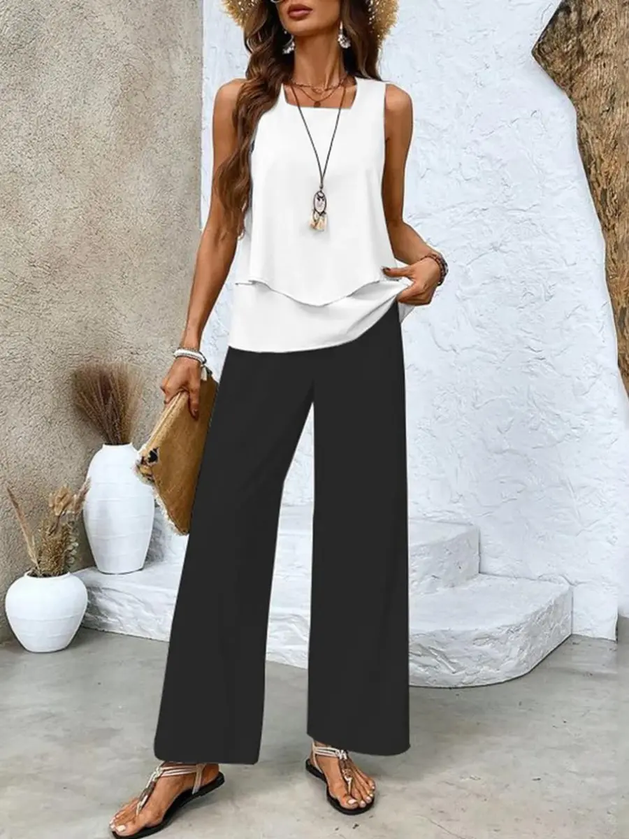 Women's plus size layered chiffon top and wide-leg trousers set in breezy summer tones