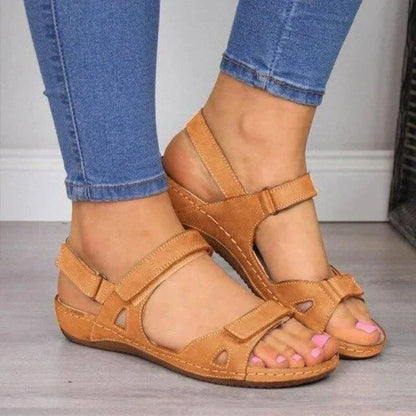 Women's beige comfort open-toe wedge sandals with adjustable Velcro straps and comfort support footbed