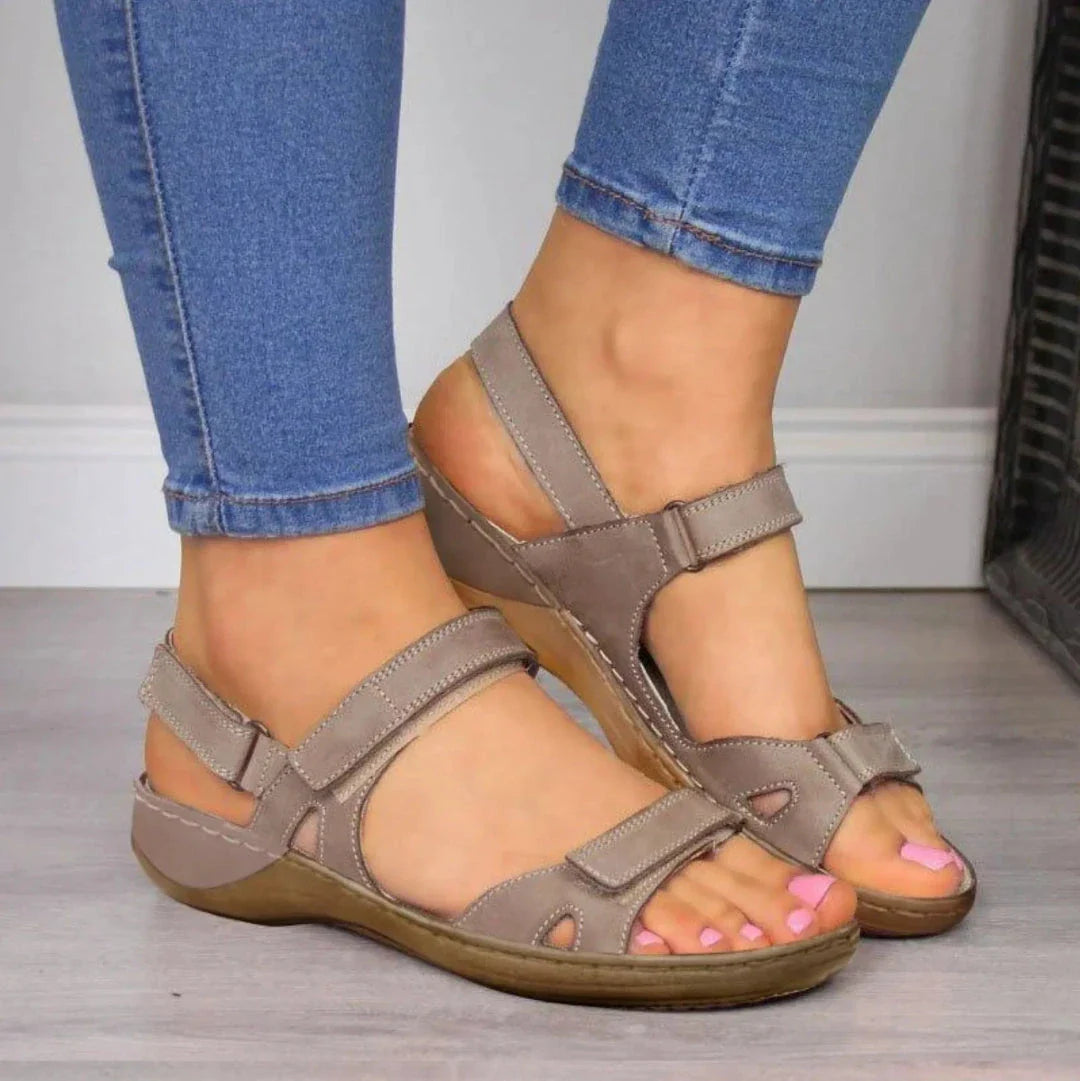 Women's beige comfort open-toe wedge sandals with adjustable Velcro straps and comfort support footbed