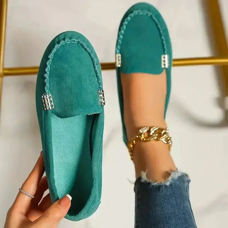 Women's lightweight black loafers with clean timeless silhouette and feather-light slip-on design