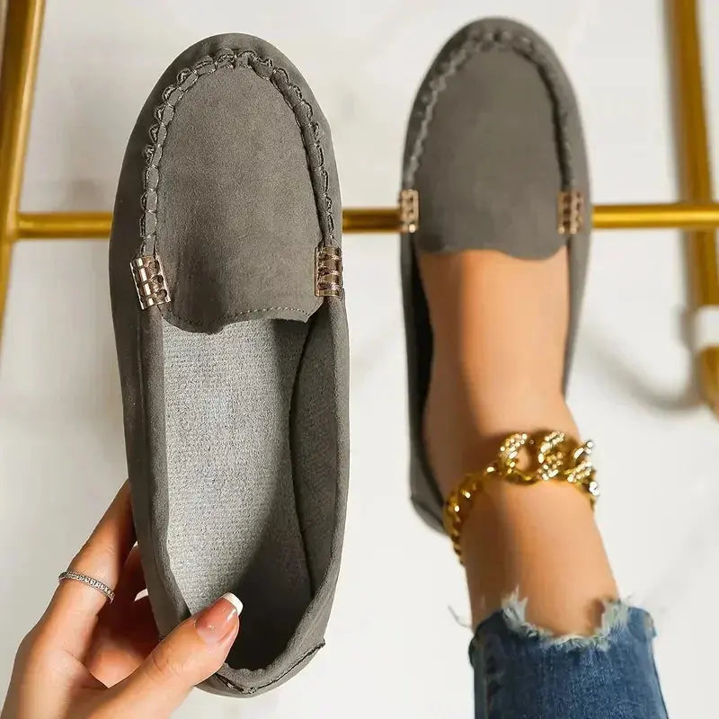 Women's lightweight black loafers with clean timeless silhouette and feather-light slip-on design