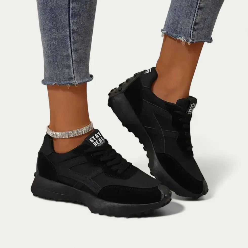 Women's white modern sneakers lightweight cushioned trainer sleek fashion-forward silhouette