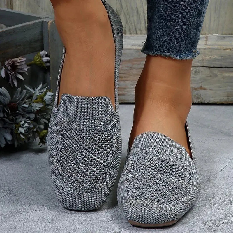 Women's white lightweight slip-on sneakers with vulcanized sole, casual everyday style