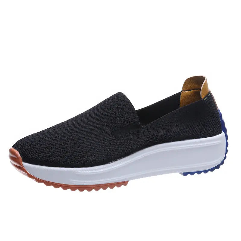 Women's lightweight slip-on mesh sneakers in neutral tones with cushioned sole for all-day comfort