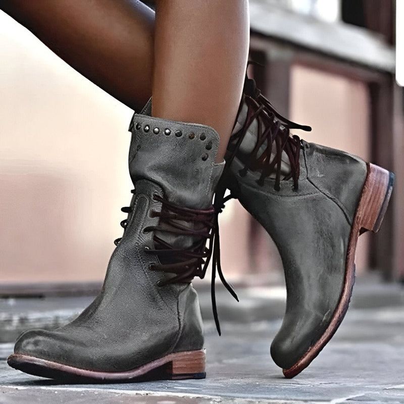Women's black lace-up ankle boots with adjustable closure and sleek everyday silhouette