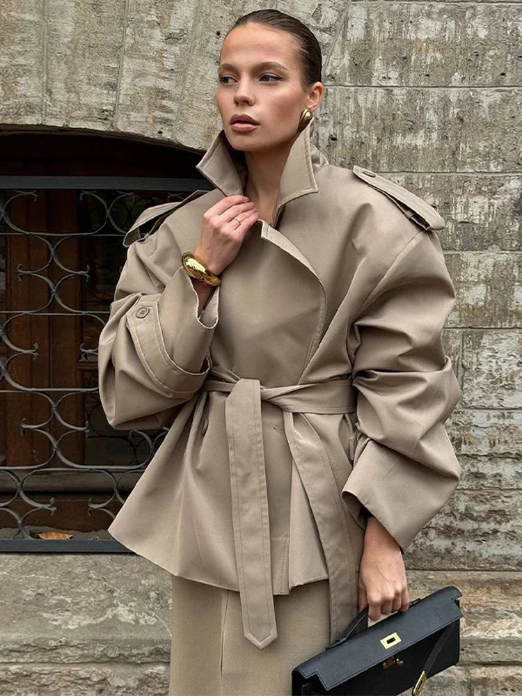 Lily cropped trench coat structured wide-shoulder silhouette with lapel collar and self-tie belt