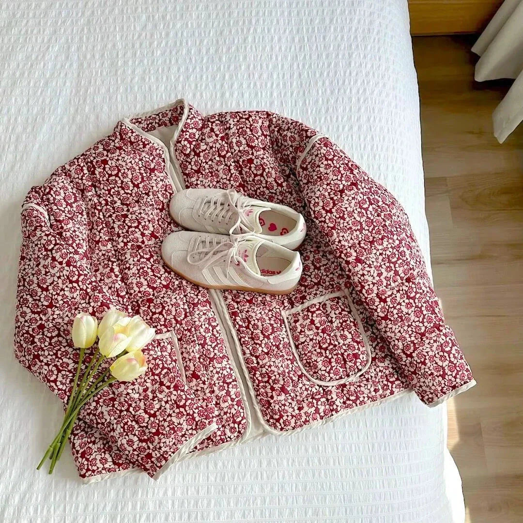 Women's red and cream quilted floral jacket with open-front fit and soft cozy lining