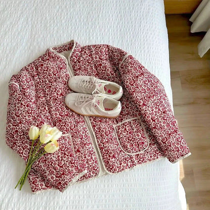 Women's red and cream quilted floral jacket with open-front fit and soft cozy lining