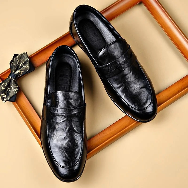 Men's genuine leather penny loafer in classic tan, sleek slip-on design with cushioned insole