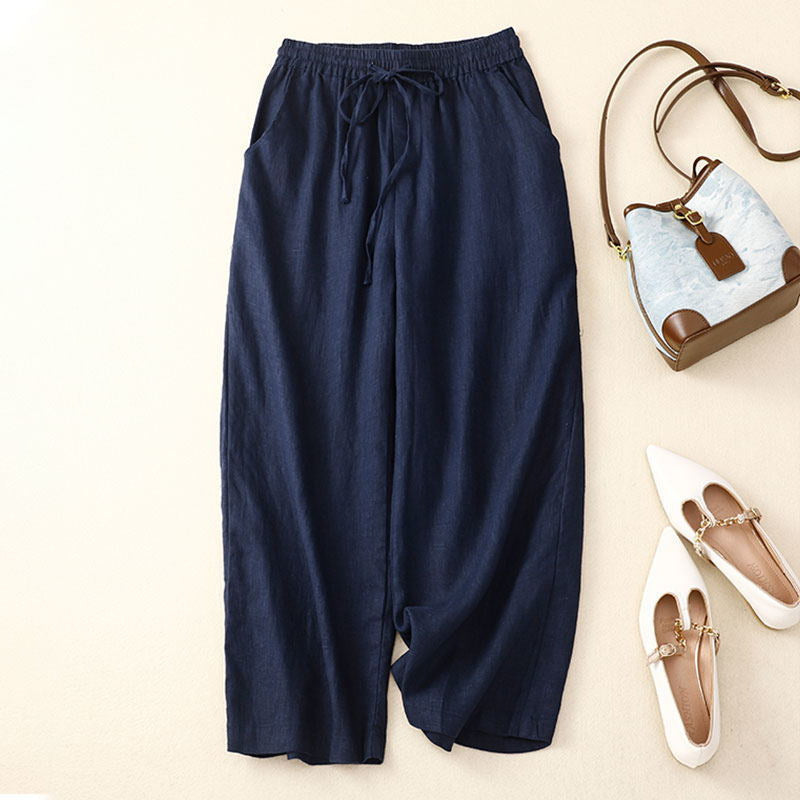 Liora beige wide-leg linen pants with adjustable drawstring waist, relaxed elegant fit
