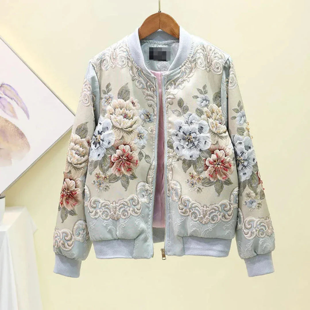 Women's black satin bomber jacket with 3D floral embroidery, ribbed cuffs, and front zip closure