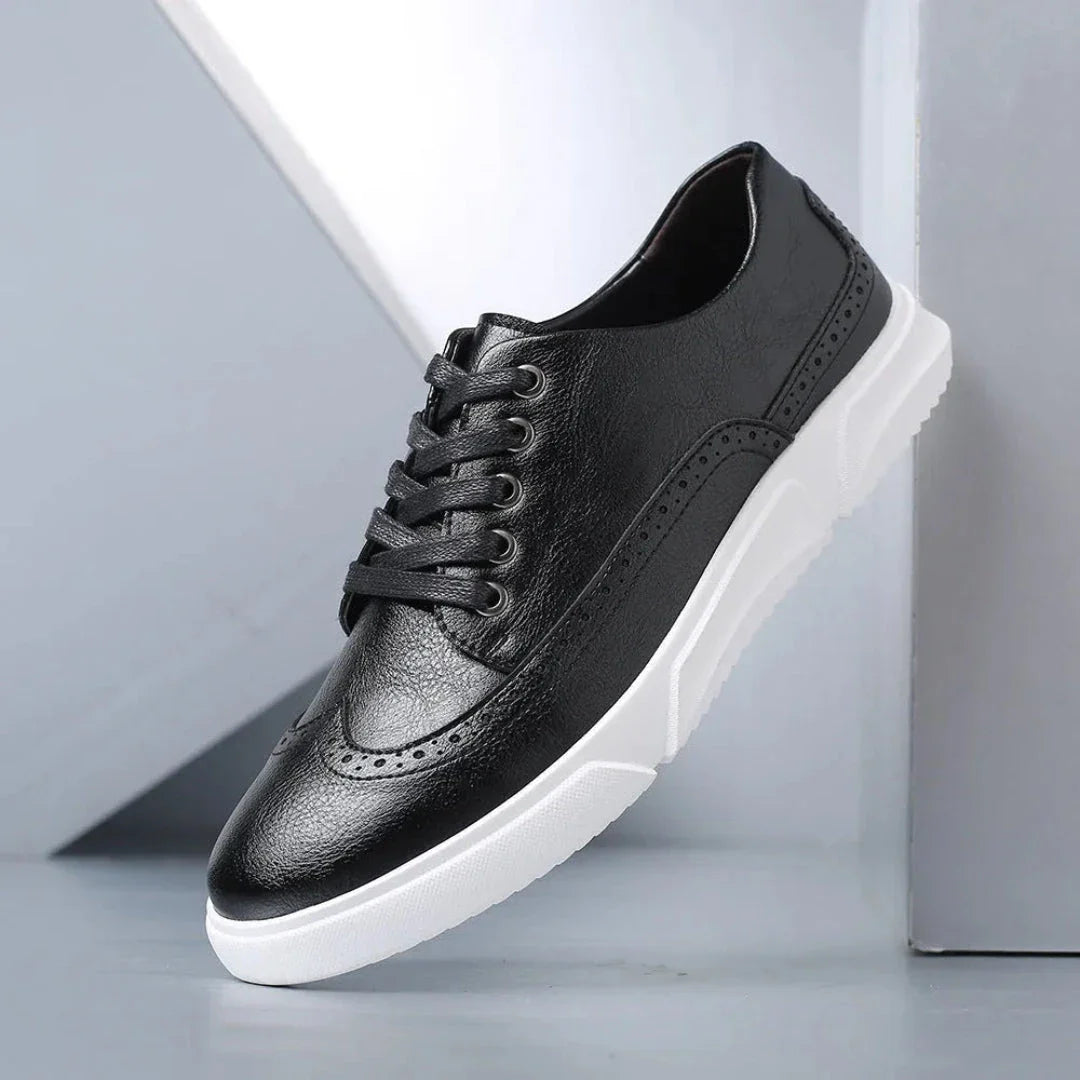 Men's brown faux leather wingtip brogue sneakers with white sole, casual dress style
