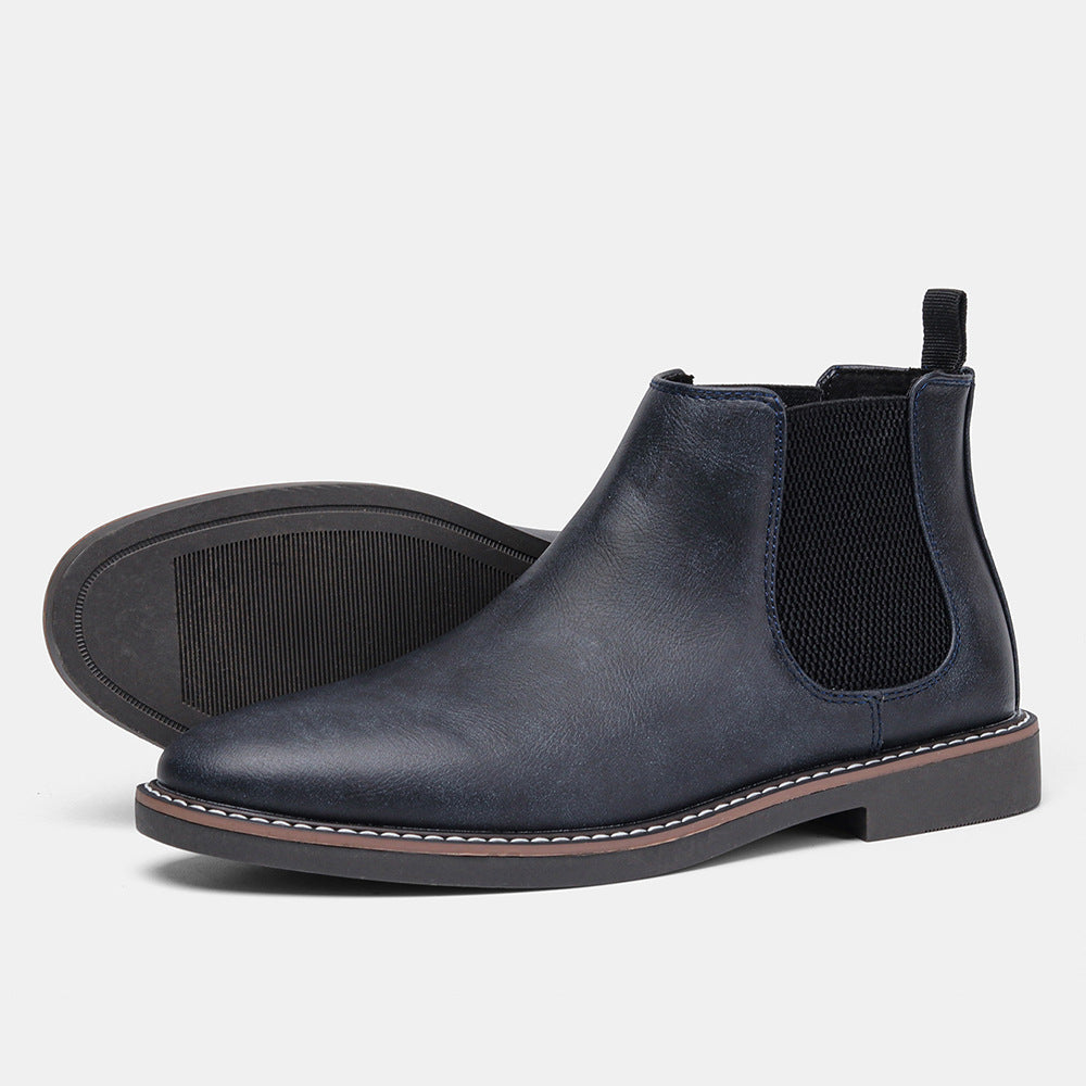 Lorenzo Chelsea boots in sleek black PU leather with slip-on elastic band and durable rubber sole