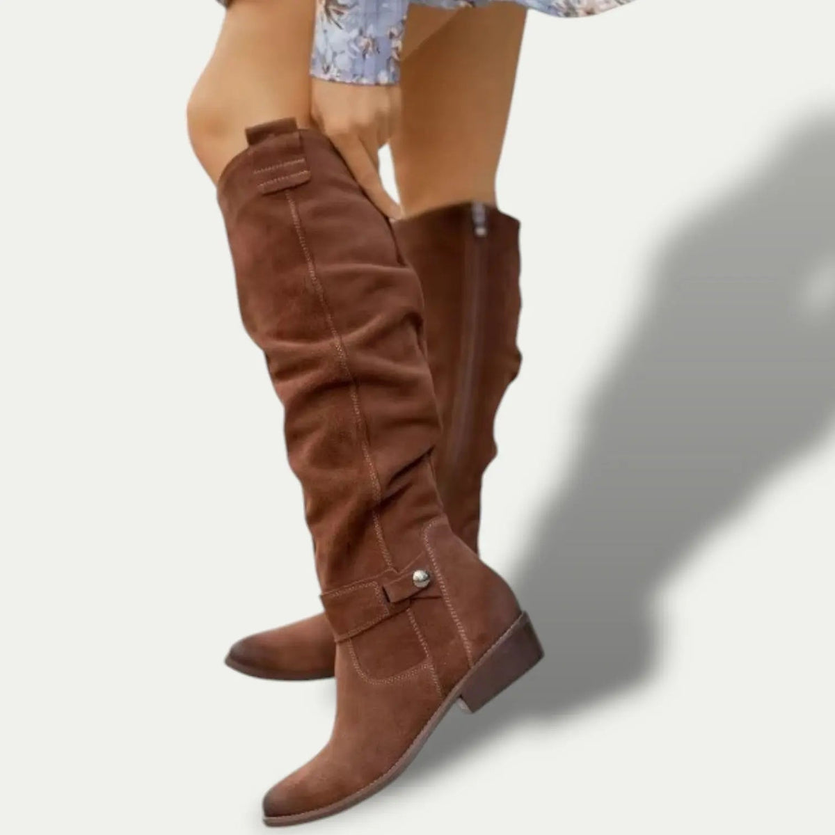Women's low-heel tan suede cowboy boots with Western stitching and comfortable everyday fit