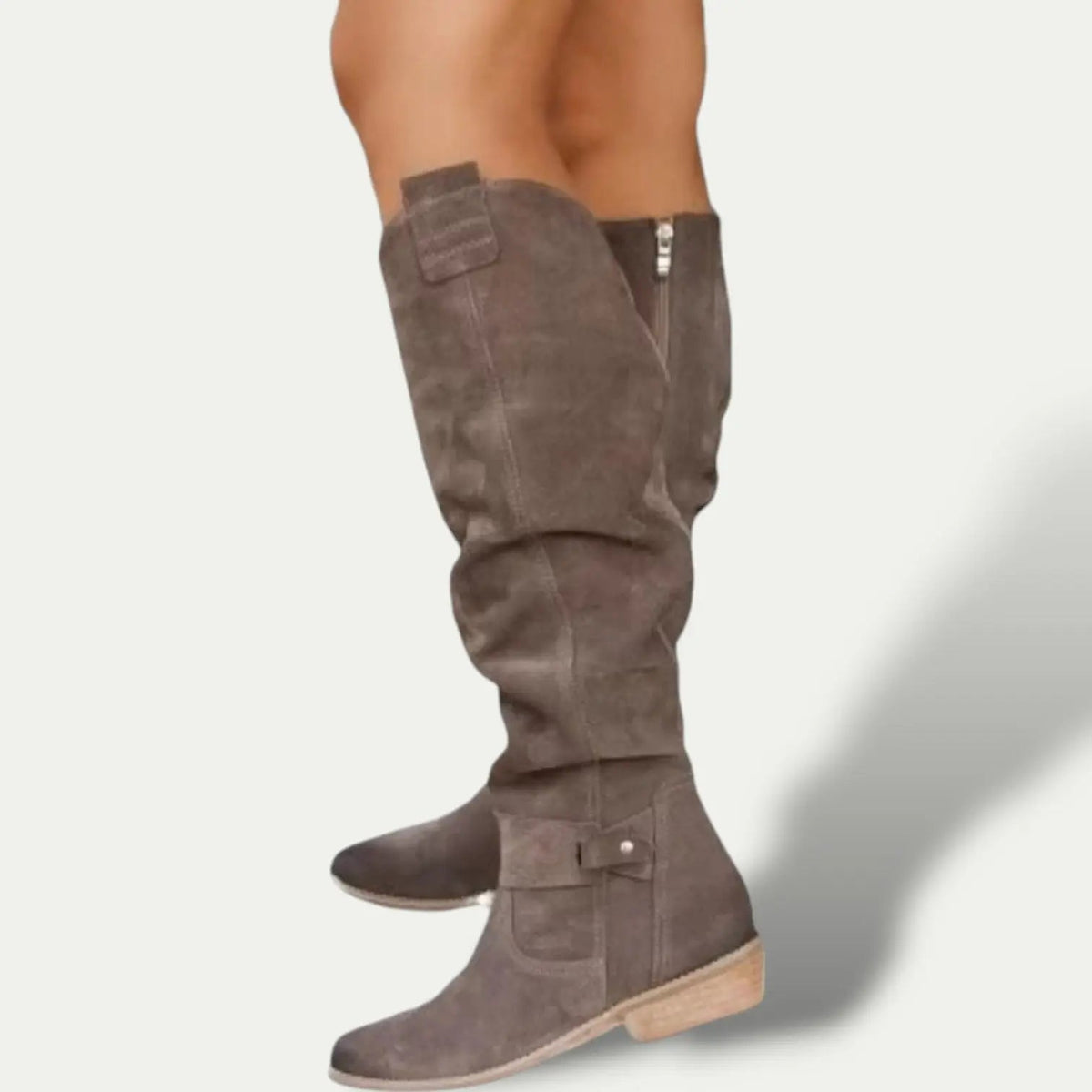 Women's low-heel brown suede cowboy boots with Western stitching and slip-resistant sole