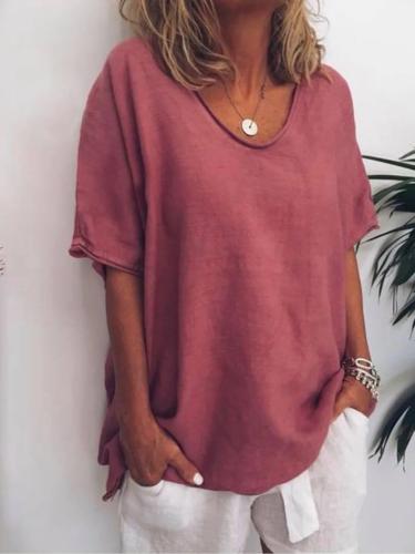 White linen-look relaxed T-shirt with dropped shoulders, round neckline, and side slits