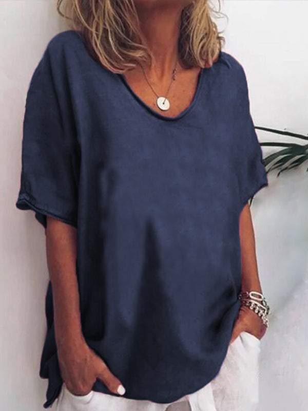 White linen-look relaxed T-shirt with dropped shoulders, side slits, and round neckline