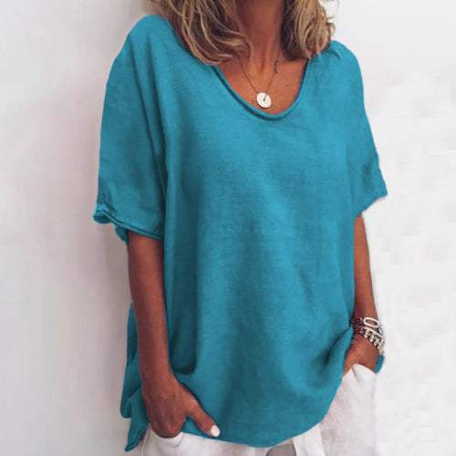 White linen-look relaxed T-shirt with dropped shoulders, side slits, and round neckline