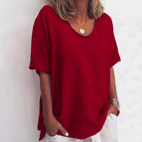 Relaxed white linen-look T-shirt with dropped shoulders, round neckline, and side slits