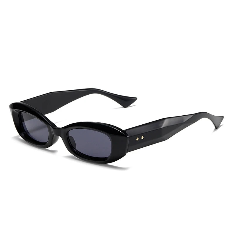 Slim oval cat-eye sunglasses glossy sculpted frame retro-inspired bold statement look