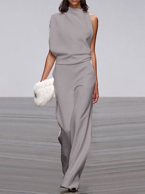 Women's sleeveless one-shoulder wide-leg jumpsuit with asymmetric neckline and fluid formal silhouette
