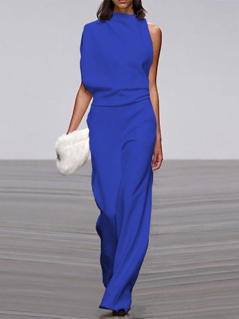 Women's sleeveless one-shoulder wide-leg jumpsuit with structured asymmetric neckline and fluid formal silhouette