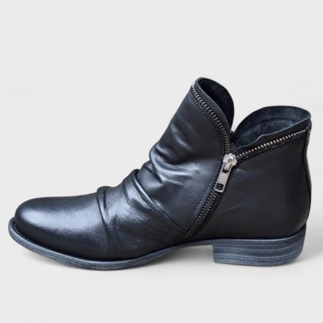 Maggie comfort boots in neutral tones with cushioned support and ergonomic slip-on design
