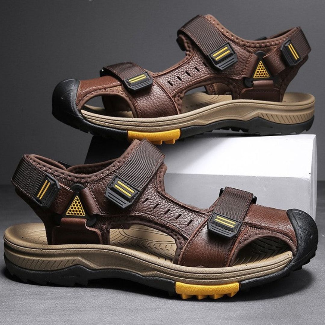 Magnus TrailGuard men's hiking sandals with adjustable straps, cushioned footbed, rugged outdoor design