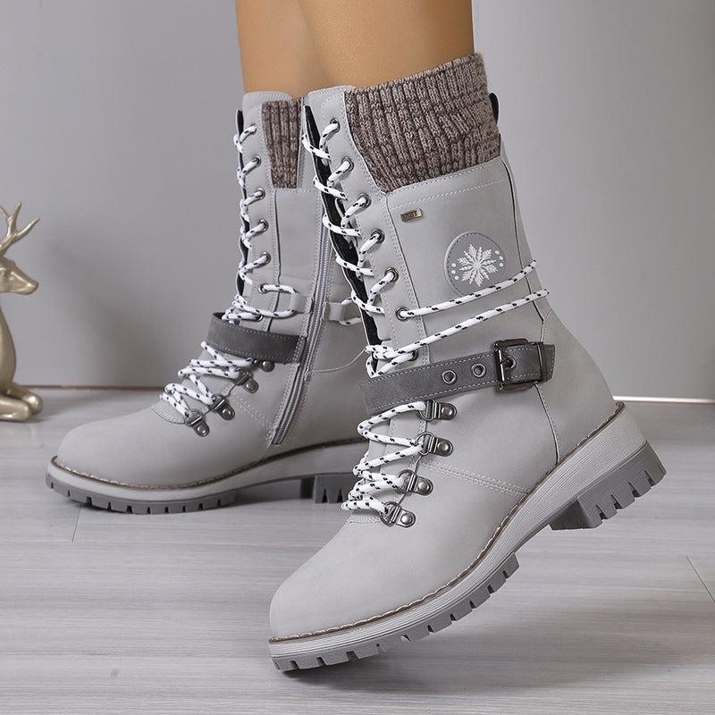 Women's brown leather lace-up winter boots with robust non-slip sole for secure cold-weather fit