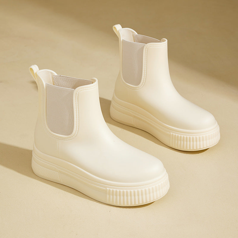 Mona sleek waterproof rain boots in classic black with streamlined silhouette for stylish wet-weather wear
