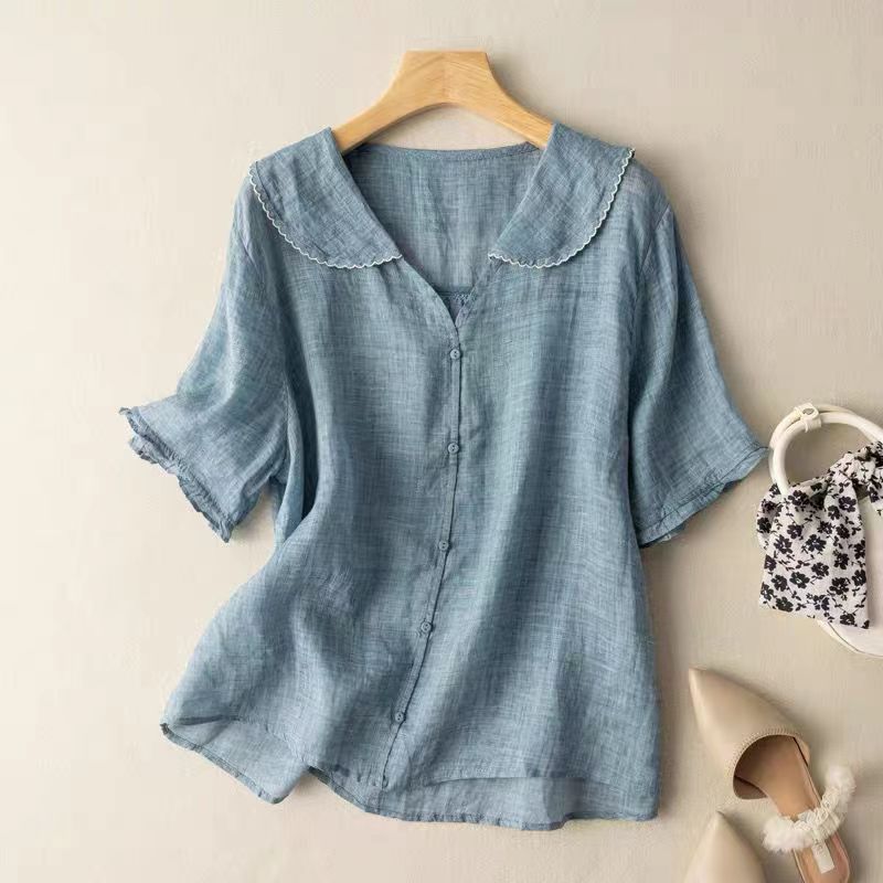Vintage women's blouse soft pink scalloped collar button detail relaxed elegant silhouette