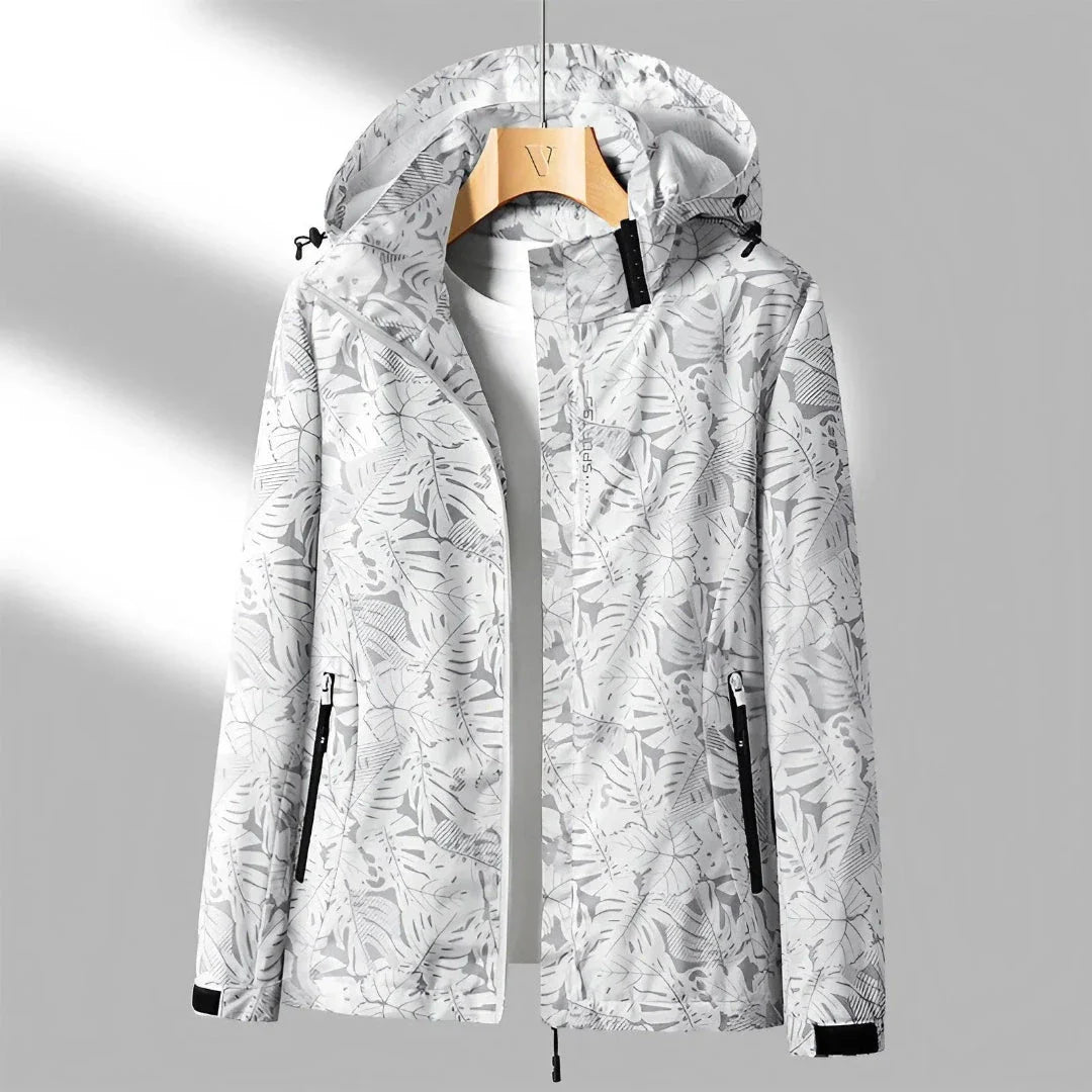 Women's lightweight waterproof jacket in neutral tone, adjustable hood, wind-resistant for outdoor wear