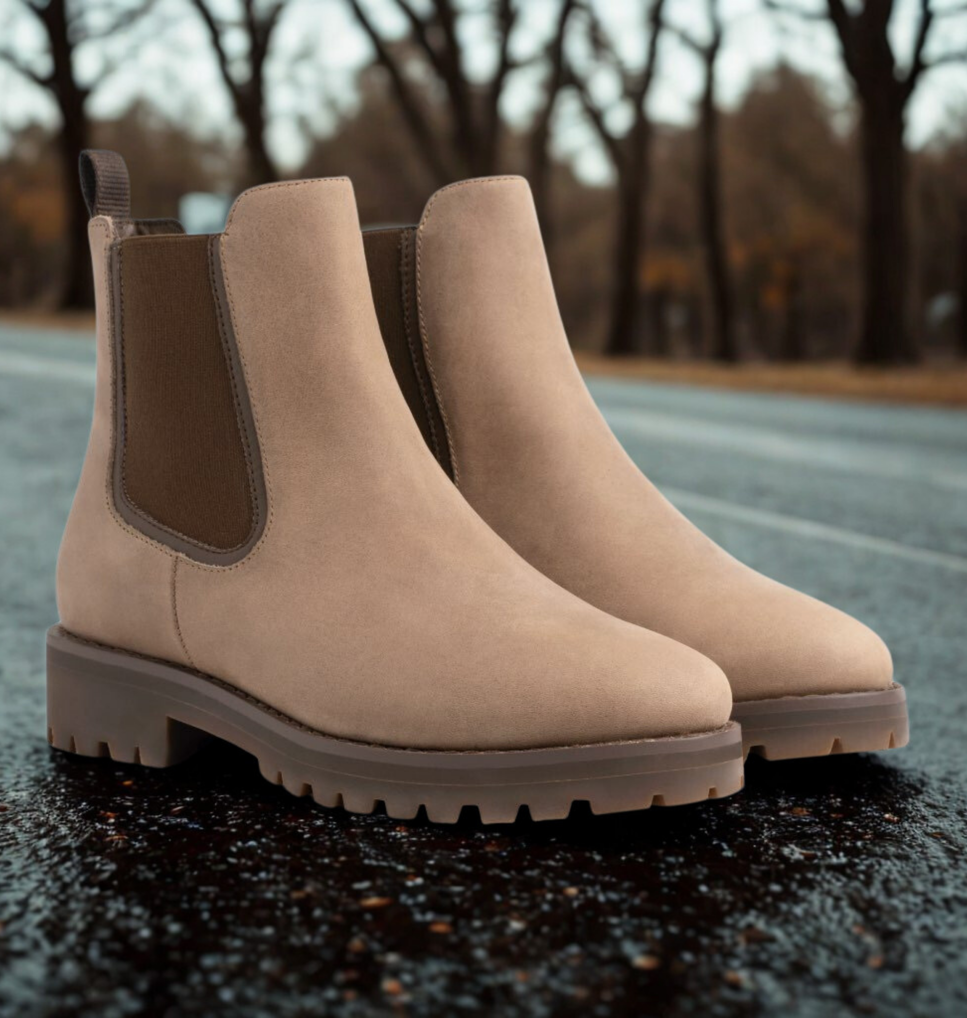 Women's black ankle boots chunky lug sole sleek upper bold contemporary silhouette leg-lengthening