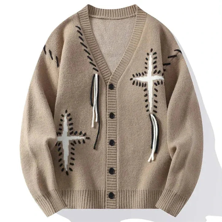 Women's soft knit V-neck button-down cardigan with bold Japanese-inspired stitch detail and hanging thread accents