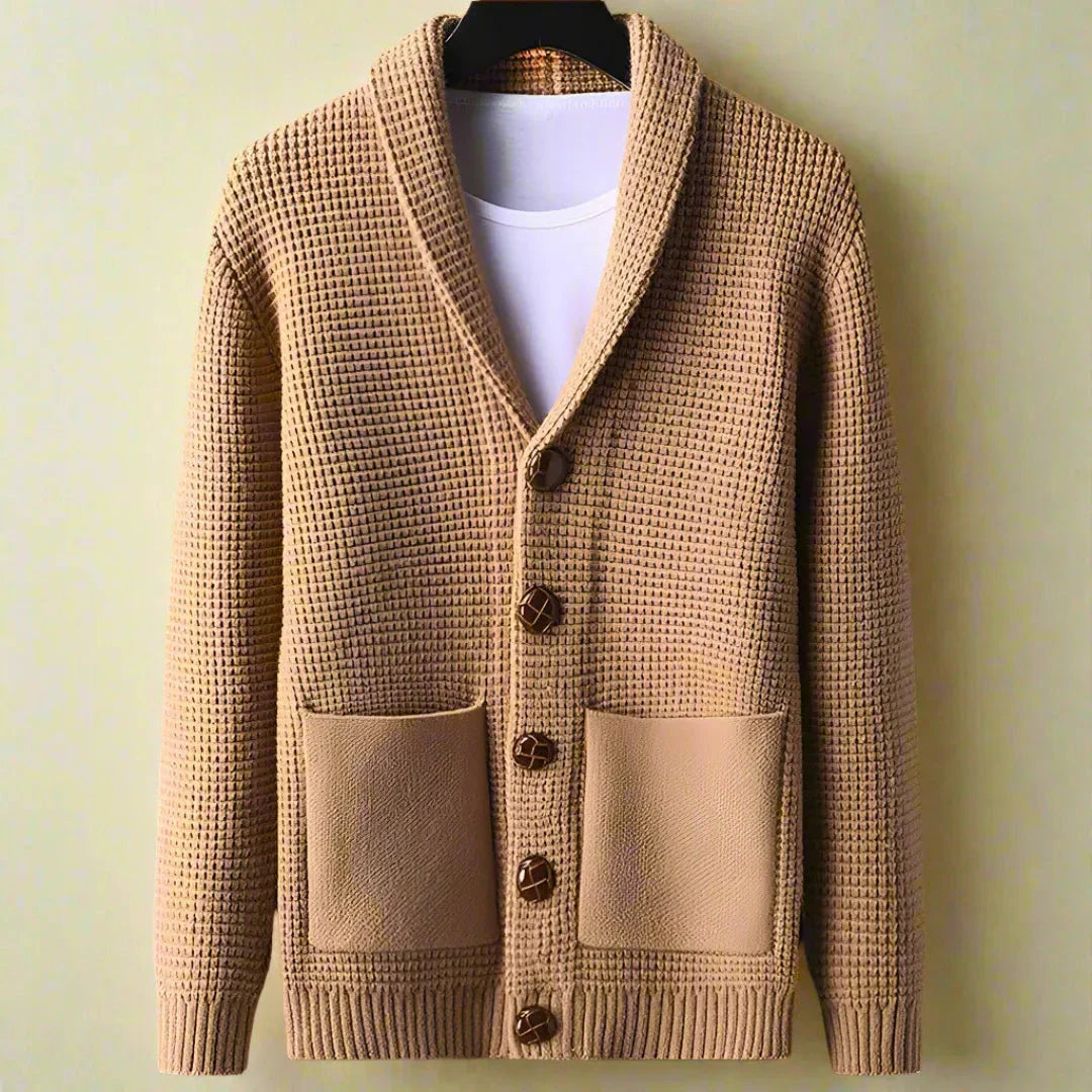 Classic waffle-knit shawl collar cardigan with patch pockets and button closure, relaxed polished fit