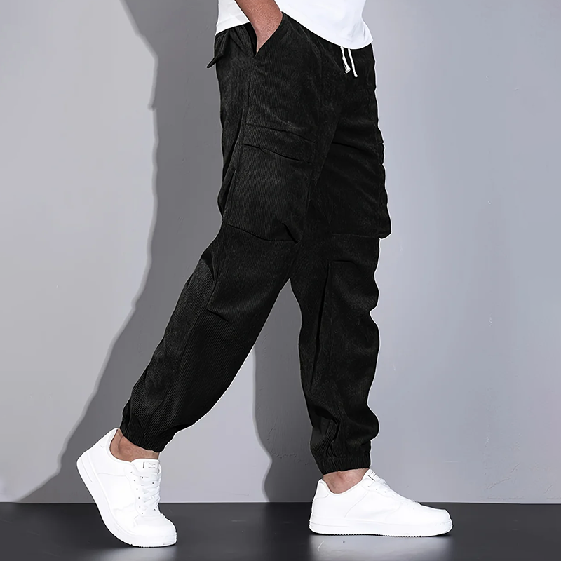 Men's brown corduroy cargo jogger pants with drawstring waist and multiple utility pockets