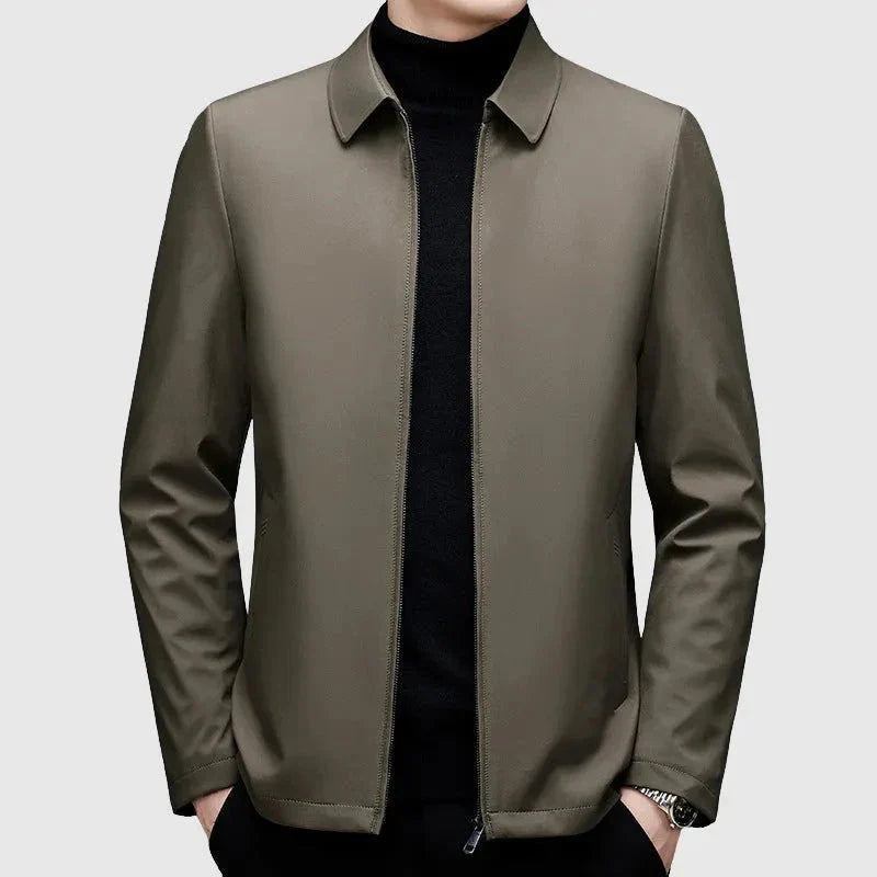 Men's navy slim-fit down jacket with turn-down collar and full zip front for smart casual style