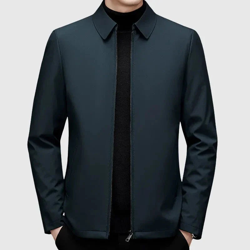 Men's navy slim-fit down jacket with turn-down collar and full zip front for smart casual style