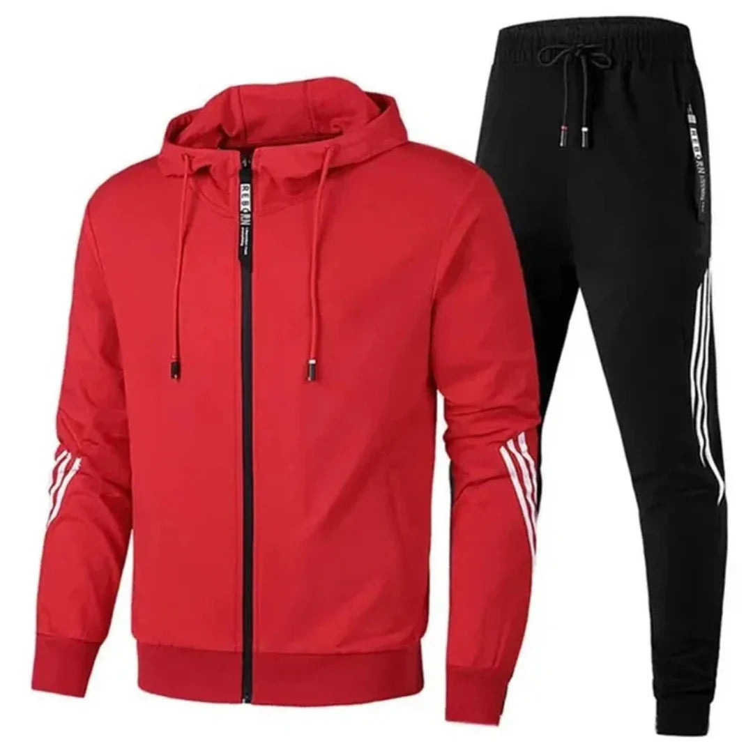 Navy men's two-piece tracksuit set with zip-up jacket and relaxed fit joggers in premium fabric
