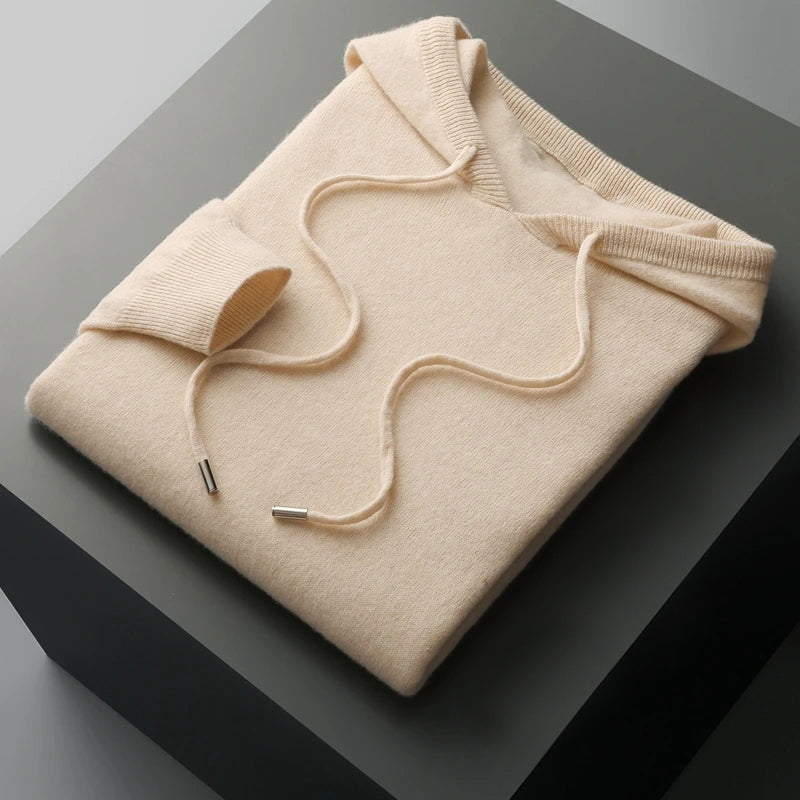 Men's loose-fit merino wool hoodie with drawstrings, temperature-regulating winter layer in neutral tone
