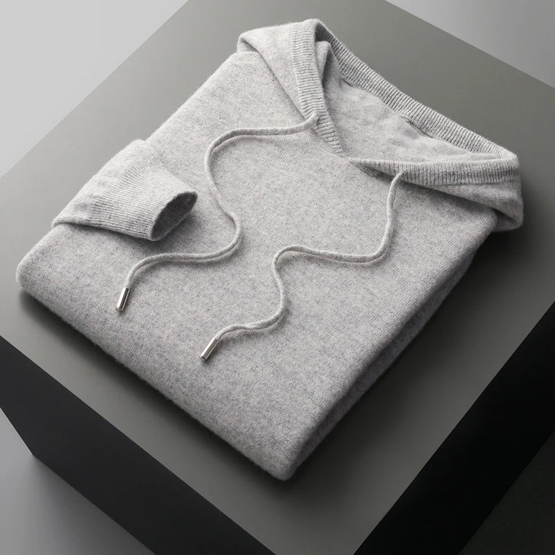 Men's gray merino wool hoodie with adjustable drawstrings, loose fit, temperature-regulating winter layer