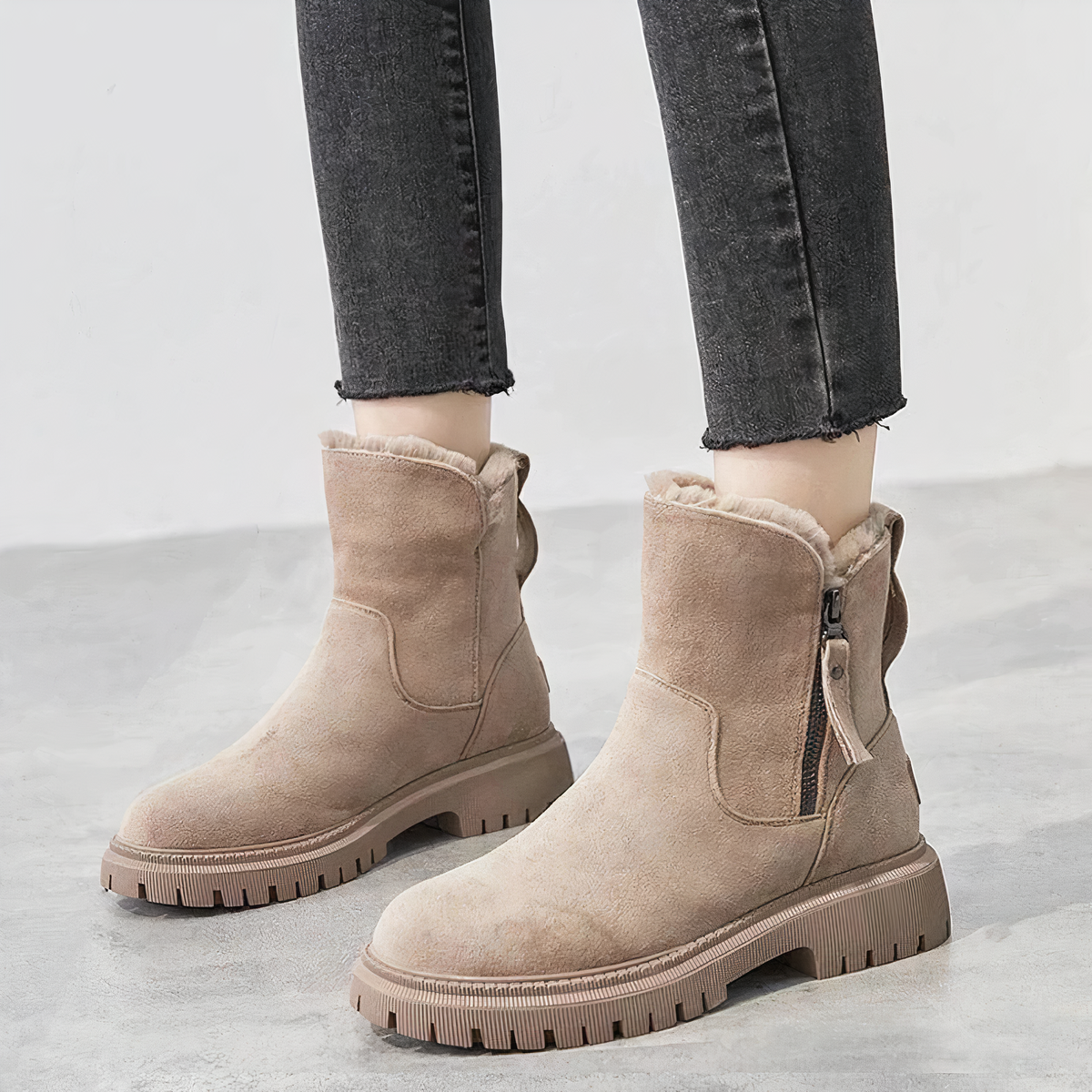 Women's mid-calf snow boots in neutral tones, cozy plush fur lining, rugged winter style