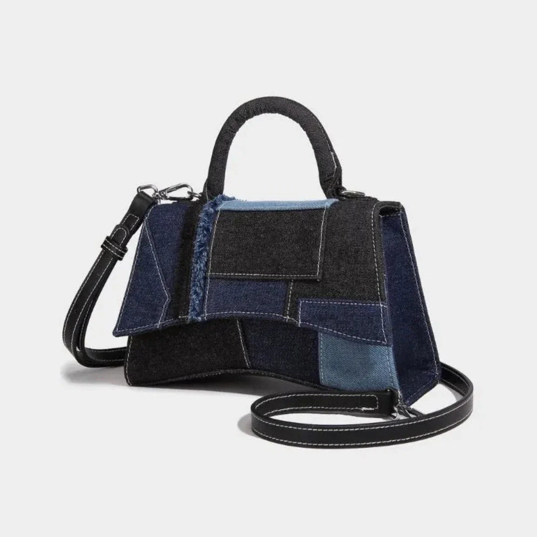 Mini structured denim patchwork handbag with raw-edge accents and detachable crossbody strap