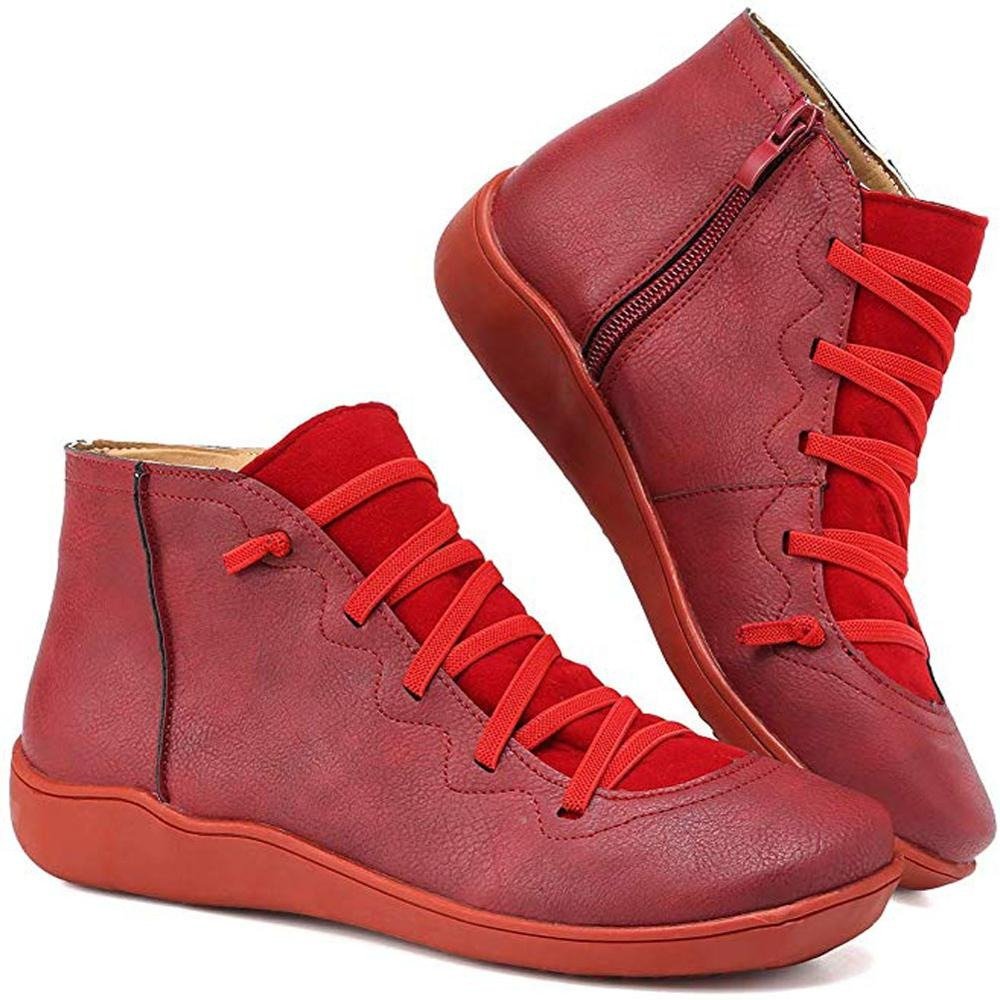 Women's minimalist black lace-up ankle boots with sleek silhouette and clean modern lines