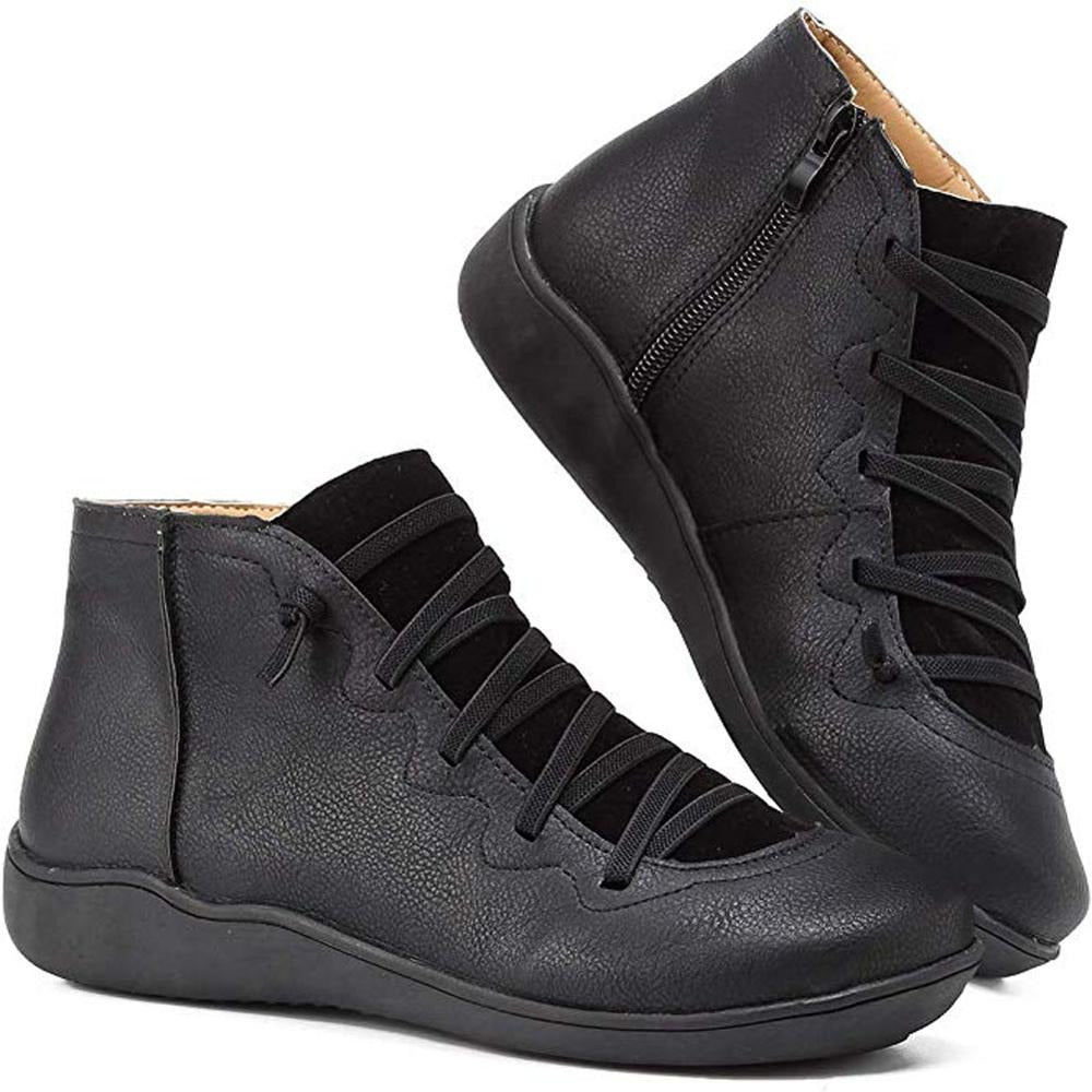 Women's black minimalist lace-up ankle boots with clean lines and sleek low-profile silhouette