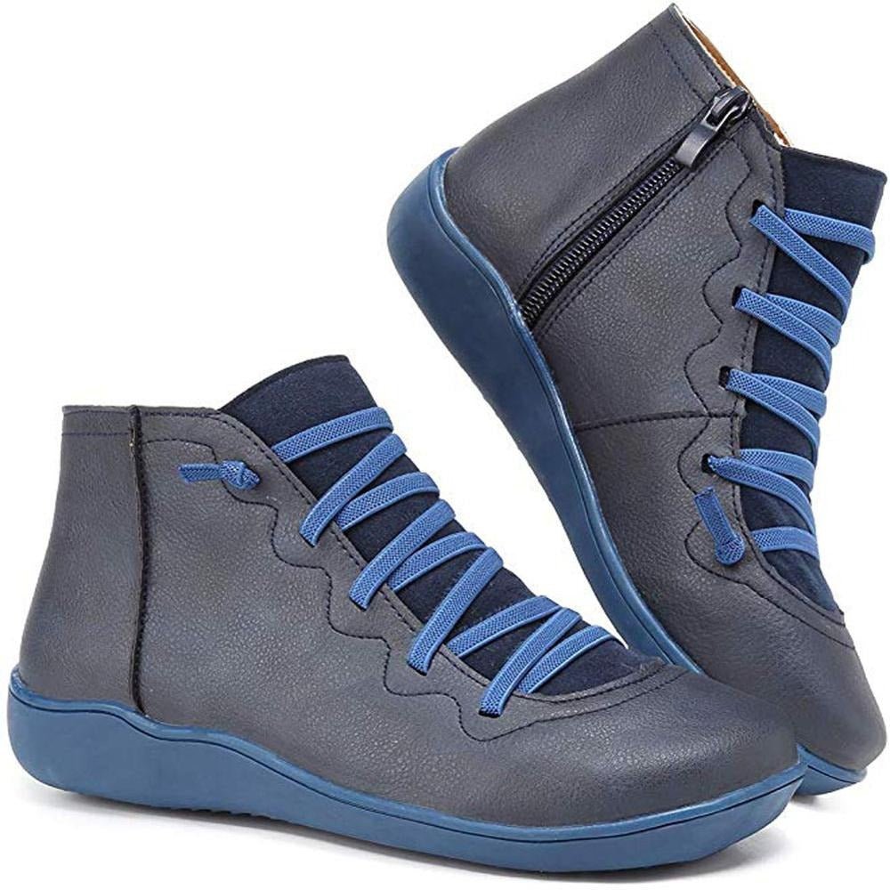 Women's black minimalist lace-up ankle boots with sleek silhouette and clean modern lines