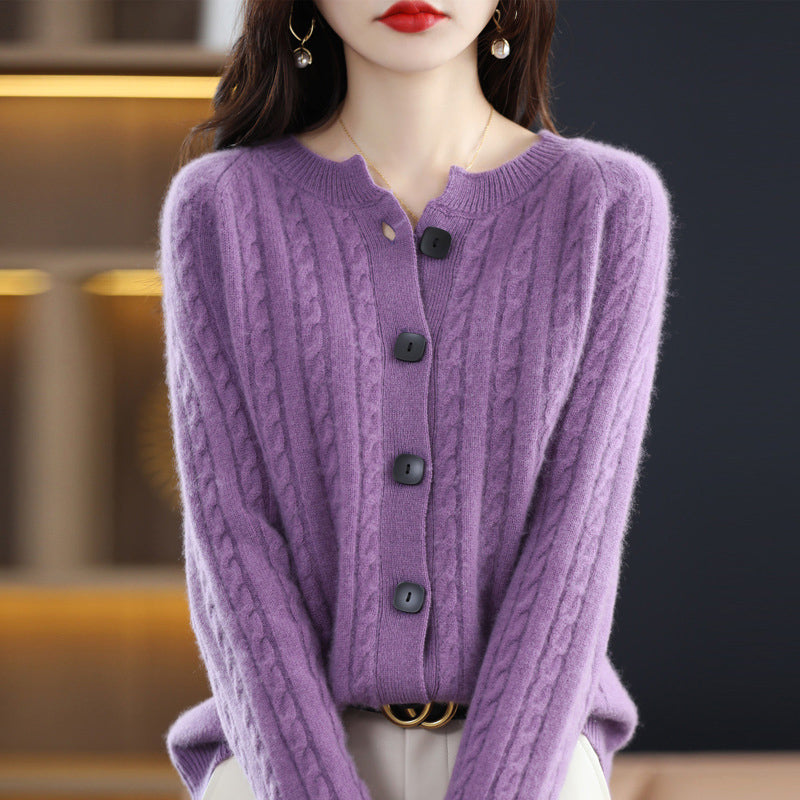Beige minimalist cable knit cardigan with round neck, front buttons, ribbed cuffs, and soft plush texture