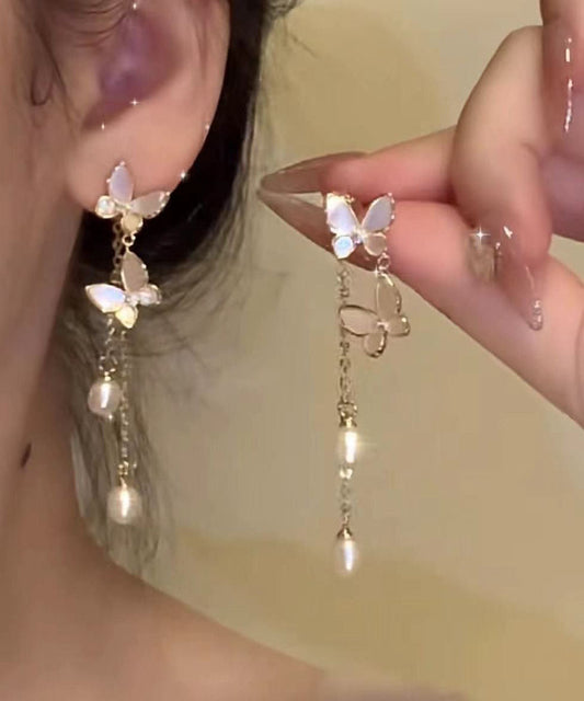 Boucles d'oreilles pendantes modernes en alliage de cuivre doré et perles, motif papillon et pompon - Wavlynn