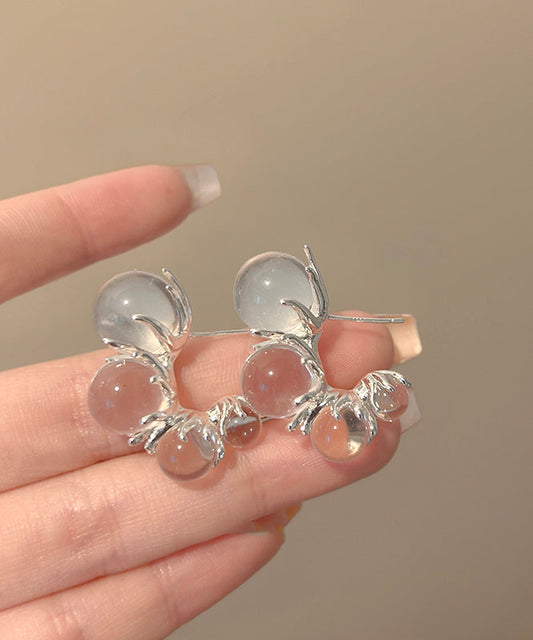 Boucles d'oreilles créoles asymétriques en résine cuivrée et nude modernes en forme de C - Wavlynn